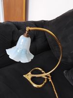 antique art nouveau brass lamp with vaseline glass bell lampshade.