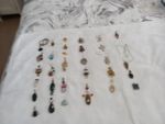  Job Lot of 31,  Sterling Silver 925 pendants with various semi precious stones.
