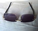 Cartier CT0243S Rimless Black Metal Sunglasses Gradient  Lens 59-16 140