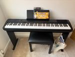 Working Casio Plug In Piano With Stool And Music Books And Beginners Notefinder