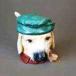 TOBACCO JAR SHAPE OF SMOKING DOG WITH GREEN HAT, POSSIBLY GERMAN PORCELAIN RARE