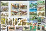 PREHISTORIC ANIMALS DINOSAURS ON STAMPS 100 ALL DIFFERENT   COLLECTION  27/3/26