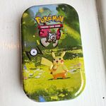 Pokémon TCG Celebrations Mini Tin Pikachu Artwork 60ct Storage Tin With Booster