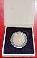 50 years of PRIDE uncirculated 50 pence piece - perspex case & presentation box.