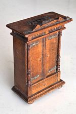 Antique wooden moneybox in the form of a wardrobe possible apprentice piece