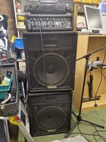 Karaoke machine, 2 speakers, several microphones, TV many disks, list of disks
