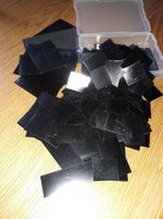 100 Hawid Pockets (stamp mounts) black backing, mixed sizes, incl. larger ones..