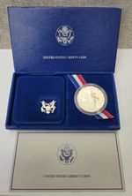 United States 1986 Liberty Coin Ellis Island .900 Silver Dollar + Case 
