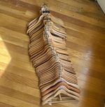 47 wooden coat hangers
