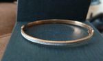 9ct Gold bangle with Encrusted Cubic zirconia