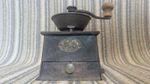 Antique, vintage metal coffee mill by A. Kenrick and Sons. Heavy.Good condition.
