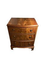 Mahogany Bow Front Chest Fitted With Three Drawers With Brass Ring Handles.
