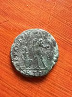 3 Roman Coins and 1 British half penny