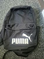 PUMA Black Logo Daypack Backpack with Adjustable Straps & Extra Compartments