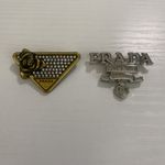 Prada Luxury Designer Brooch Pins A Set Of Two.