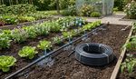 16mm Pressure Compensating Drip Line Irrigation Pipe Black 33cm Spacing