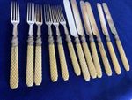 Twelve piece hallmarked Sheffield silver & ivorine cutlery set