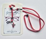 Red Eye Glasses Strap, Adjustable Chain is made of PU leather.