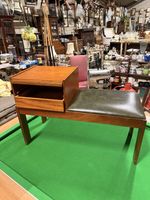 Vintage mid-century teak entry bench with upholstered seat.