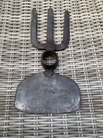 Vintage old farm tool head