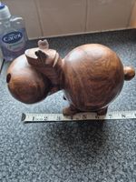 hand carved wooden hippo.condition  slight crack on top  but hardly notice