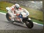 CASEY STONER HAND SIGNED 12X8” PHOTO DUCATI RACING 2 X MOTOGP CHAMP HONDA PROOF