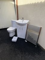 Bathroom Accessories set including, Toilet, sink, towel rail and shower screen