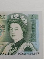 Bank of England One Pound Note Featuring Queen Elizabeth II and Sir Isaac Newton