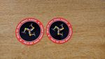 2x Isle of Man TT races decals - red/black border + legs - 50mm decals 