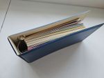 Album Containing 30 Jersey Mint Stamp Presentation Packs