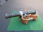 METAL 18th CENTURY NAVAL CANNON ON ITS WOODEN GUN CARRIAGE