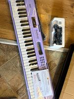 Funtaki FK-61S 61-Key Full Size Purple Electronic Keyboard w/ Power Adapter