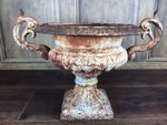 ANTIQUE CAST IRON GARDEN URN / PLANTER WITH TWIN SCOLLING HANDLES, 19thC