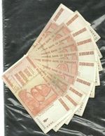 Zimbabwe 10xfifty billion dollars banknotes used