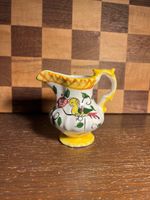 Small Yellow Accented Pitcher with Parrot Picture A296
