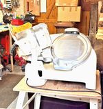 Berkels gravity feed electric meat slicer.