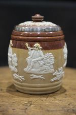 Antique Doulton Lambeth tobacco jar with silver rim decorated with hunting scene