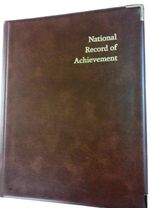 NATIONAL RECORD OF ACHIEVEMENT PVC A4 FOLDER IN BROWN LEATHER LOOK - GOLD PRINT