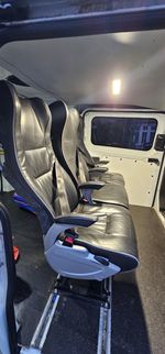 van leather seats with seatbelts 