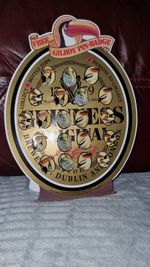 Guinness DISPLAY Card.  20 Enamel Badges.