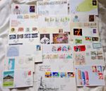 70 good quality 1st day covers mixed dates mixed countries & a good selection.