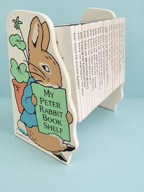 Vintage Peter Rabbit Wooden book shelf Beatrix Potter & 23 books.  1987