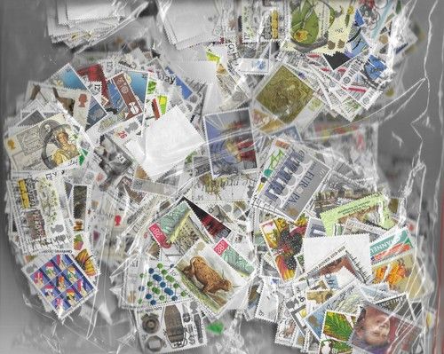 1 Kilo GB used mix stamps ( 10,000 stamps) off paper