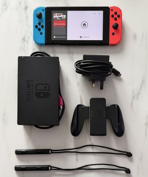 Nintendo Switch Console 32GB Neon Blue/Red Joy-Cons & Accessories Bundle — image 1