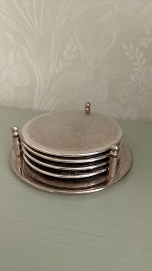Elegant silver plated drinks coasters set of 4 with holder embossed filigree