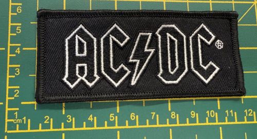 AC/DC White On Black Woven Sew Or Iron On Patch Officially Licensed — image 1