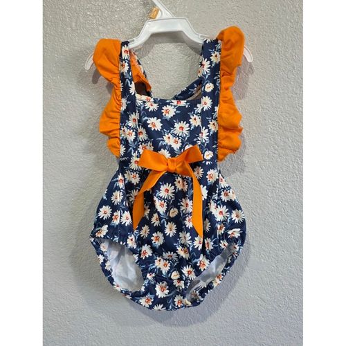Navy Daisy Romper with Orange Ruffles and Bow In The Back — image 1