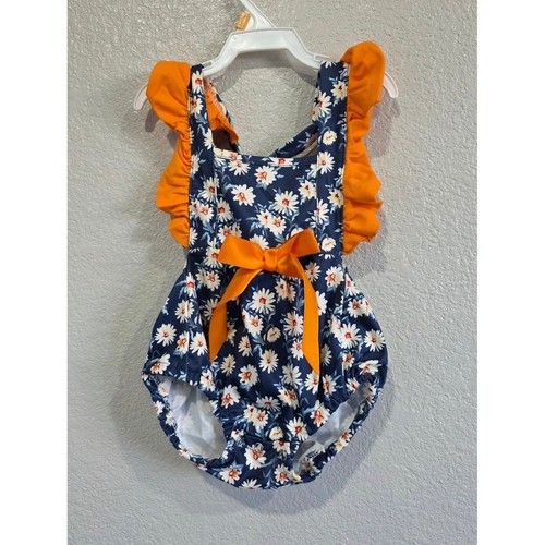 Navy Daisy Romper with Orange Ruffles and Bow In The Back