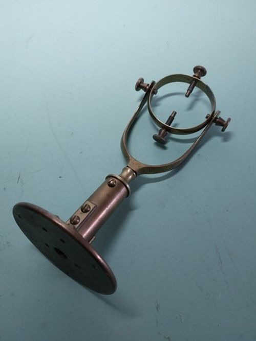 Old brass gimbal bracket for marine stick barometer