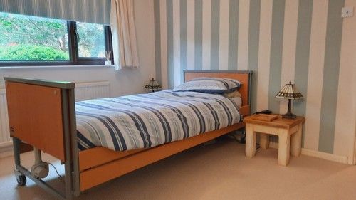 Profiling Electric Hospital Bed With Mattress & Side Rail Kit by Invacare